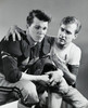 Young man consoling a football player Poster Print - Item # VARSAL25521767