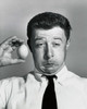 Close-up of a businessman holding a lemon and making a funny face Poster Print - Item # VARSAL25512174B