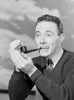 Man smoking pipe outdoors Poster Print - Item # VARSAL255422959