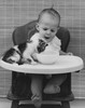 Baby feeding a kitten Poster Print - Item # VARSAL2551022C