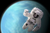 Artist's concept of an astronaut floating in outer space. A water covered planet is illuminated by a nearby star. Poster Print - Item # VARPSTMRC200103S