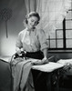 Mid adult woman ironing clothes Poster Print - Item # VARSAL25519585