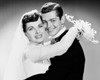 Portrait of newlywed couple embracing Poster Print - Item # VARSAL255756
