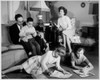 Parents and their children sitting in the living room Poster Print - Item # VARSAL25513271