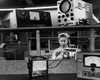 Female electrician wiring electronic components in a workshop Poster Print - Item # VARSAL25537781