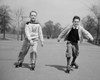 Two boys roller skating in park Poster Print - Item # VARSAL255422377
