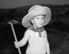 Portrait of a boy holding a hoe Poster Print - Item # VARSAL2551488