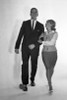 Mid adult couple marching Poster Print - Item # VARSAL255418020