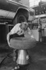 Auto mechanic repairing a tire of a car Poster Print - Item # VARSAL25540443