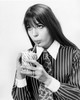 Close-up of a young woman drinking from a disposable cup Poster Print - Item # VARSAL25512676