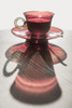 A red glass cup a saucer with a beverage reflected on a white surface; Locarno, Ticino, Switzerland PosterPrint - Item # VARDPI12281436