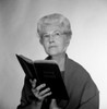 Portrait of senior woman reading book Poster Print - Item # VARSAL255418307