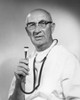 Portrait of a male doctor holding a stethoscope Poster Print - Item # VARSAL25512767