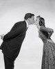 Side profile of a young couple kissing Poster Print - Item # VARSAL2555802