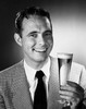 Portrait of a mid adult man holding a glass of beer Poster Print - Item # VARSAL2554213B