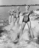 Four young women waterskiing in the sea Poster Print - Item # VARSAL25510955