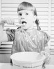 Close-up of a girl eating Poster Print - Item # VARSAL25513953B