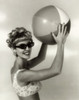 Close-up of a young woman holding a beach ball Poster Print - Item # VARSAL2941120