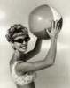 Close-up of a young woman holding a beach ball Poster Print - Item # VARSAL2941120