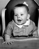Baby boy sitting in high chair smiling Poster Print - Item # VARSAL2559714A