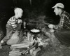 High angle view of a father and his son cooking on a camping trip Poster Print - Item # VARSAL25514301