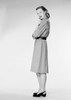 Young woman standing and looking at camera  studio shot Poster Print - Item # VARSAL255422953
