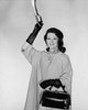 Portrait of a young woman holding a handle Poster Print - Item # VARSAL25541865