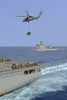 An MH-60S Sea Hawk helicopter transfers supplies during a replenishment at sea Poster Print - Item # VARPSTSTK108265M