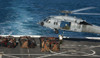 Marines attach cargo to an MH-60S Sea Hawk helicopter Poster Print - Item # VARPSTSTK105258M