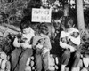 Three children sitting and holding puppies Poster Print - Item # VARSAL2551577B