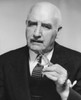 Portrait of a businessman holding eyeglasses Poster Print - Item # VARSAL2553451B