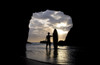 Surfer Inside A Cave At Muriwai New Zealand PosterPrint - Item # VARDPI1829381