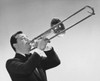 Mid adult man playing a trombone Poster Print - Item # VARSAL2556471A