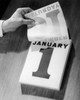 Close-up of a person's hand tearing a day from a calendar Poster Print - Item # VARSAL25528546