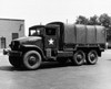 Army truck parked in front of a building  US Military Poster Print - Item # VARSAL2556252