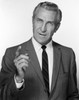 Portrait of senior businessman gesturing  studio shot Poster Print - Item # VARSAL255416564