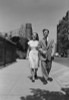 Young couple walking arm in arm in street Poster Print - Item # VARSAL255422968