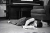 Young boy sleeping on floor Poster Print - Item # VARSAL255418263