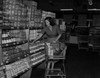 Young woman shopping in supermarket Poster Print - Item # VARSAL255422748