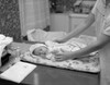 Mother nursing baby on table Poster Print - Item # VARSAL2559201