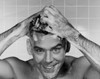 Close-up of a young man washing his hair Poster Print - Item # VARSAL25527330B