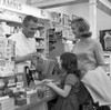 Mother and daughter shopping at chemists Poster Print - Item # VARSAL255421051