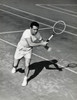 Young man playing tennis on tennis court Poster Print - Item # VARSAL25549950