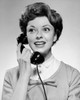 Close-up of a young woman talking on the telephone and smiling Poster Print - Item # VARSAL25519025D