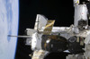 November 22, 2009 - A docked Soyuz spacecraft over the docked space shuttle Atlantis. A scene of Earth's horizon forms the background. Poster Print - Item # VARPSTSTK203087S