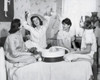 Four teenage girls sitting on a bed together Poster Print - Item # VARSAL25517424