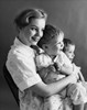 Side profile of a mother sitting with her children Poster Print - Item # VARSAL2551409B