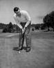 Mid adult man playing golf Poster Print - Item # VARSAL2553639