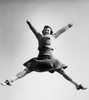 Low angle view of a female cheerleader jumping Poster Print - Item # VARSAL2559518