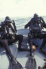 Navy SEALs combat swimmers donn their equipment in a utility boat Poster Print - Item # VARPSTWOD100199M